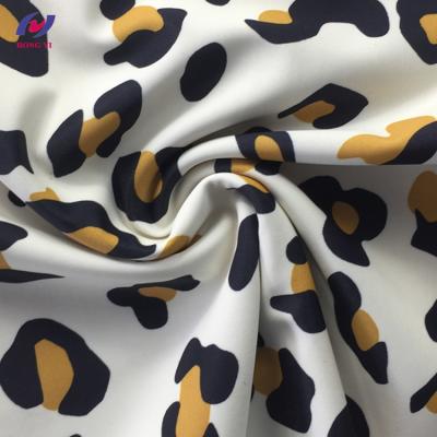 China Stretch Leopard Print UPF 50 Polyester Spandex Swimwear Fabric for sale