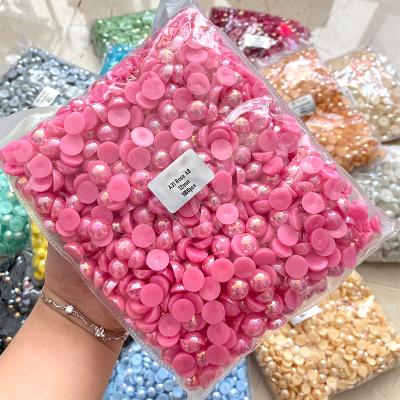 China Wholesale AOSU Flatback Rhinestone Pearl Flatback Plastic Half Round 14mm 2mm 6mm 10mm 12mm Bead For Jewelry for sale