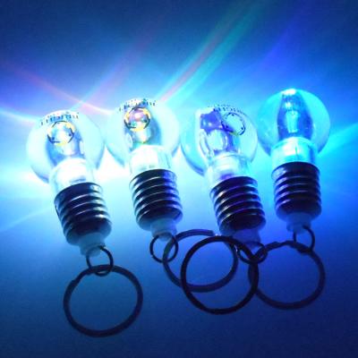 China Glow Colorful 7 Light Or Wholesale 7 Flashlight Flashlight Key Chain Different White Shatterproof Acrylic Led Bulb Key Chain With Keychain for sale