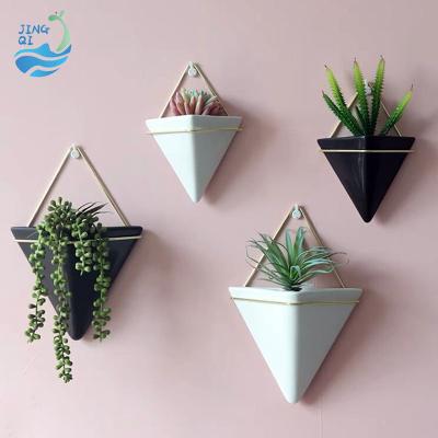 China Unique White Decorative Air Wall Mounted Nordic Triangular Flower Pot Plant Basket Flower Plant Basket Wall Mounted Hanging Pots for sale