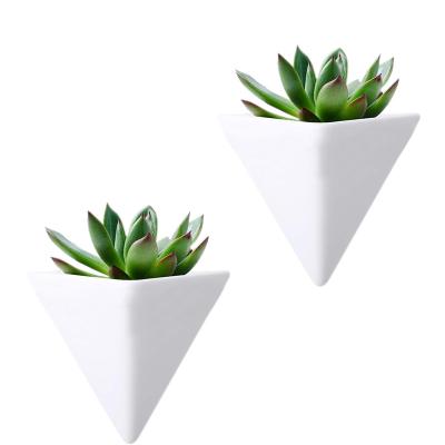 China 2022 Wholesale Cheap White Triangle Wall Mounted Small Nursery Wall Hanging Floating Flower Garden Wall Mounted Decorative Flower Pots for sale