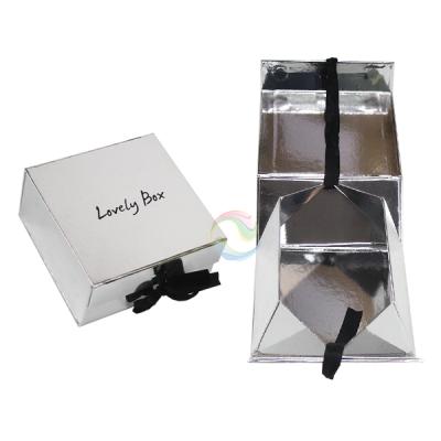 China Recyclable Elegant Silver Custom Printed Cosmetic Foldable Hardcover Gift Box With Ribbon for sale