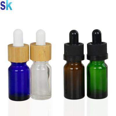 China E liquid/e juice/e cig oil/essential oil 10ml green round glass dropper bottle with black empty cap 10ml dropper bottle for liquid packaging for sale