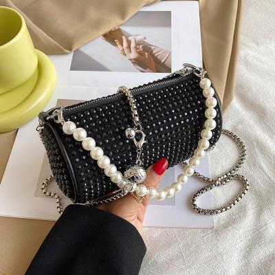 China OEM Fashion New Arrival Fashion Small Cylinder Ladies Bags Rhinestone Women Armpit Handbags With Pearl Handle for sale