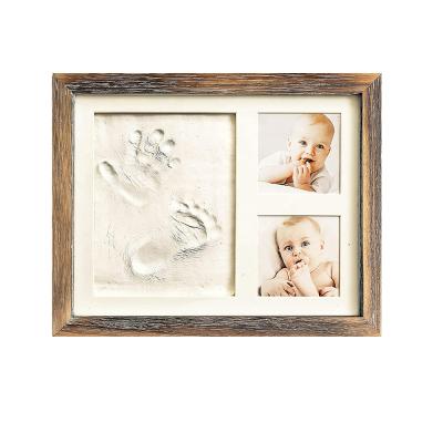 China 2020 New Design Decorative 8x10 Baby Hand and Rustic Brown Wood Footprint Custom Made Kit Frame for Baby Nursery Decor for sale