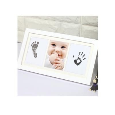 China New Baby Boy Girl Gift Decorative Hand and Footprints Inkless Kit Impression Prints Photo Frame for Keepsake for sale