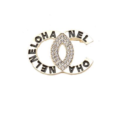 China Small Perfume Brooches Y&Y Fashion Accessories Temperament Soft Atmospheric Letter Brooches for sale