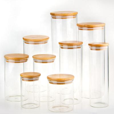 China Round Retention 20oz 28oz 31oz 43oz 45oz Freshness Borosilicate Transparent Tight Spice Bamboo Glass Air Jar With Lid Cap Bamboo Kitchen Accessories for sale