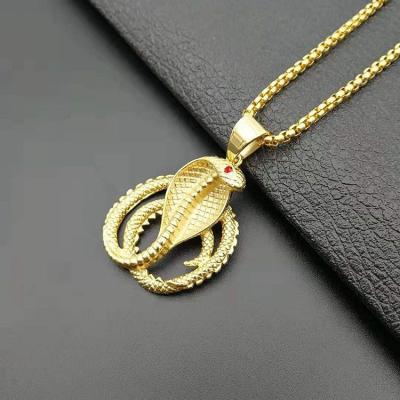 China Cobra Stainless Steel Environmental Friendly Gold Plated Jewelry Crystal Hip Hop Necklace Red Eyed Gold Plated Chase Jerk Pendant for sale