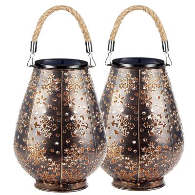 China Outdoor Auto On Garden Outdoor Lighting Energy Saving Light Led Solar Decorative Metal Tree Lantern for sale