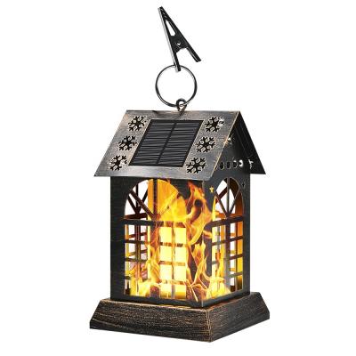 China Flame Metal Design Realistic Dancing Flickering Flame Dancing Outdoor Solar Lantern Lights LED Decoration Lights for sale