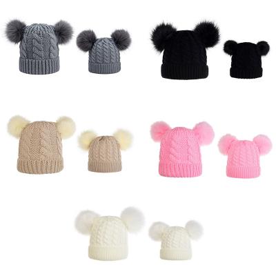 China COMMON Wholesale Solid Color Knitted Mommy and Me Pom Pom Winter Beanies High Quality Faux Fur Beanies 2 Beanies Hats for sale