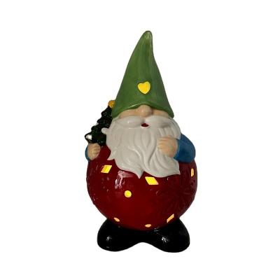 China Ceramic Color-changing Led Lighted Christmas Gnome With Holiday Tree for sale