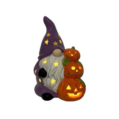 China Decorative Ceramic Gnome Halloween Gnome With Pumpkin LED Lighting for sale