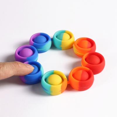 China Relieve Hot Decompression Training Intelligence Anti-Anxiety Stress 2021 Children's Toys Ability Rainbow Thinking Toy with Fizzy Hand String for sale