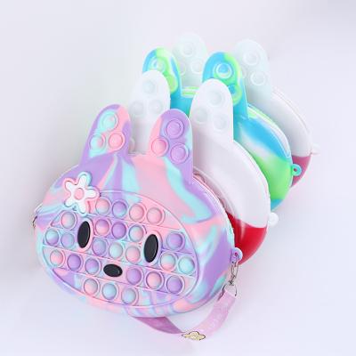 China Cartoon the new cute silicone change purse is a Mixed-color rabbit children silicone extruded noise fidgety toy banged change purse for sale