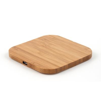 China OEM Logo Custom Design Desk Bamboo Mobile Phone Fast Charging Wooden Qi 15W Wireless Charging Wooden Wireless Charger for sale