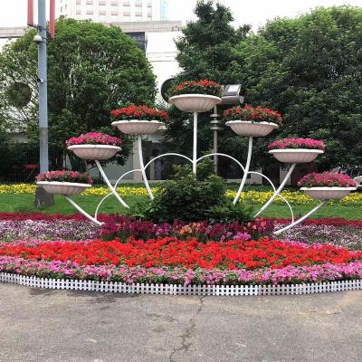 China Modern creative sectoral outdoor multi-layer flower pot rack flower stand wrought iron pot rack for sale