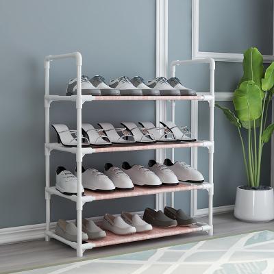 China Durable Housewares 4 Tier Metal Expandable Stackable Shoe Shelf Storage Shelving Durable Shoe Racks For Home for sale