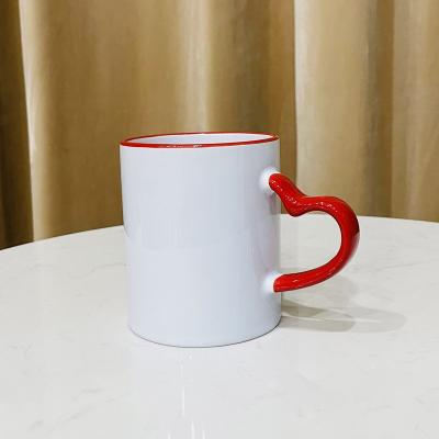 China New Arrivals 11oz Viable White Sublimation Ceramic Mug Heart Round Handle Personalized Logo Pictures Tea Coffee Mug Custom Made for sale