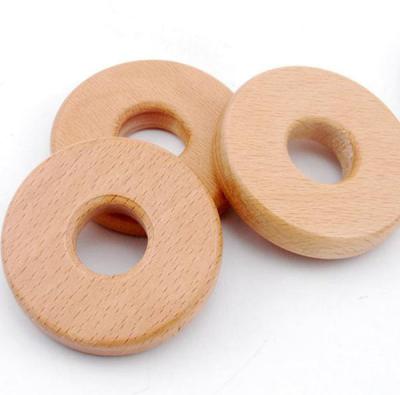 China 55 Mm Beech Flat Wood Teething Wooden Ring Baby Teething Toy Ornament Soft Toy for sale