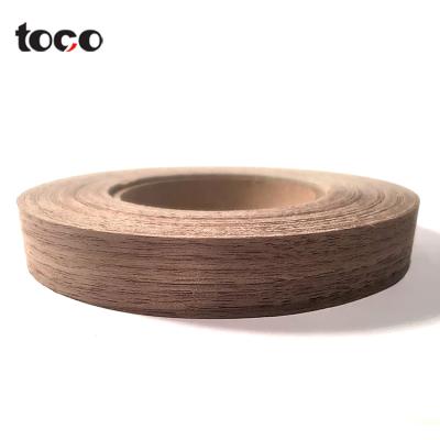 China Toco PVC Plastic Edge Cover Strip PVC Rubber Countertops Edge Edge Strip Wood Grain PVC Ledge Strip for sale