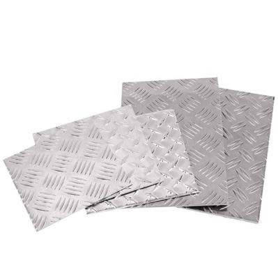 China Aluminum Checkered Construction Aluminum Plate And Tear Drop Sheet Weight Patterned Aluminum Plate for sale