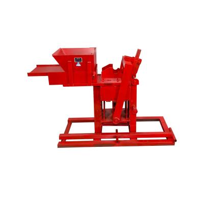 China LEGO Hotels Clay Brick Machine One Manual Interlock Universal Replaceable Block Semi-automatic Block Making Mechanism FO for sale