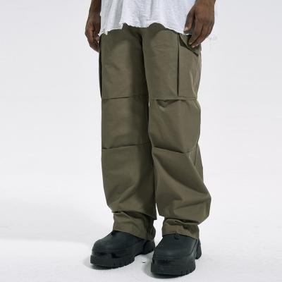 China Anti-wrinkle Custom OEM Streetwear Baggy Sweatpants Side Pockets Cargo Plain Men Wide Leg Pants for sale