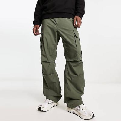 China Anti-wrinkle Custom Cargo Sweatpants Trousers With Side Pocket OEM Streetwear jogger Twill Cotton Wide Leg Baggy Cargo Pants for sale