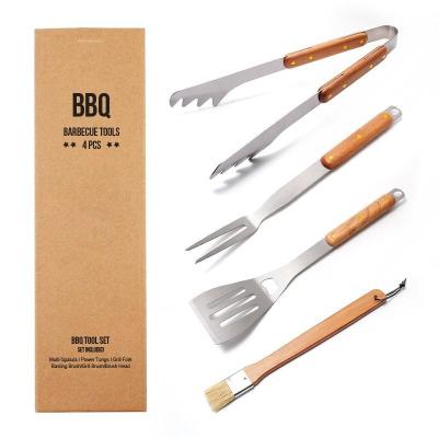 China Easily Cleaned Heavy Duty Stainless Steel Multi Function Spatula Fork Tongs And Brush Wooden Handle BBQ Grilling Tool Kit for sale