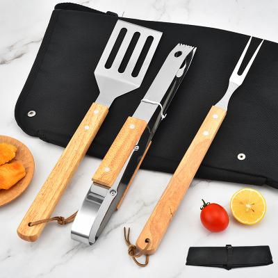 China 3PCS Easily Cleaned Hot Selling Wooden Handle BBQ Tool Kit with Apron Grill BBQ Tool with Wooden Handle BBQ Set for Outdoor BBQ Camping for sale