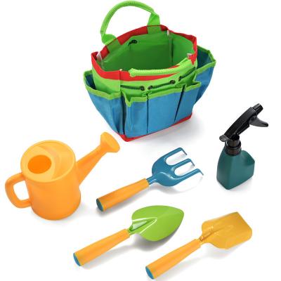 China Hot Sale Gardening Kids Garden Tool Kit Including Watering Can Shovel Fork and Rake Garden Tote Bag Gardening Tool Kids for sale