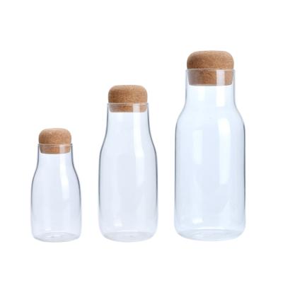 China Minimalist Style Glass Storage Jar Kitchen Stocked Food Container With High Grade Natural Cork Lid for sale