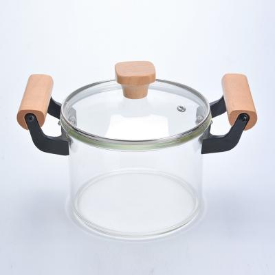 China Large Size High Borolicate Sustainable Transparent Wooden Handle Double-ear Glass Soup Pot Cooking for sale