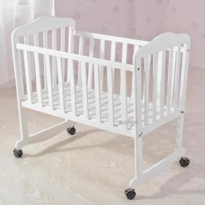 China Mini Baby Cot Bed For ET Bedroom Baby Modern Cute Safe White Wooden Kids Furniture Four Wheels for sale