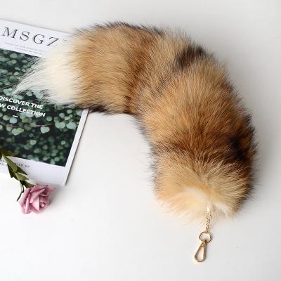 China Fuzzy Fuzzy Jtfur Customized Dyed Plush Fox Tail Dangle Key Charms Fluffy Fox Fur Key Chain for sale