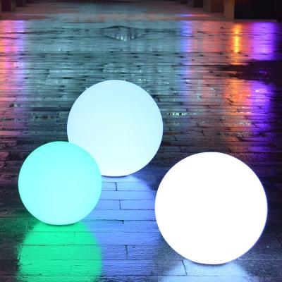 China Garden Decoration Glow Floating Flat Ball Lighting Dimmable Remote Control RGB LED IP65 PE Rechargeable Outdoor Garden Pool Light for sale