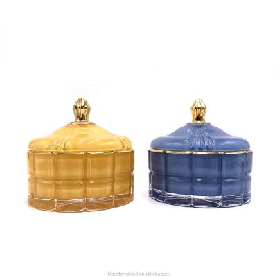 China Home Decoration GEO Cut Indigo Yellow Round Rose Gold Wax Cup New Style Candle Glass Jar With Lid Retail Candy Jar Hot Selling Home Decor for sale