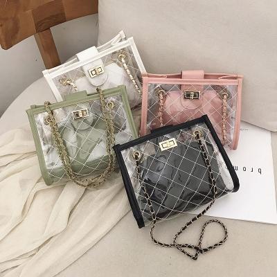 China The clear 2pcs women handbags women bags bags shape to shoulder bags to clear free space hand Jelly Clutch Purse Transparent for sale