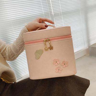 China High Quality New Model Double Layer Tote Big Capacity Portable PU Suka Price Good Price Cosmetic Bag Rose Makeup for sale