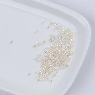 China Jewelry Making 2-2.2mm Small Size Natural Wholesale No Hole Button Freshwater Loose Beads for sale