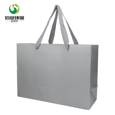 China Recyclable Custom Fancy Small Gift Paper Candy Packaging Bag With Handle for sale