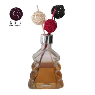 China Artistic Ins Nordic Style No Fire Tree Shape Aroma Clear Glass Diffuser Bottle Creative Christmas Glass Bottle For Office for sale