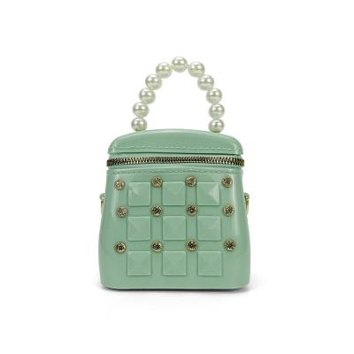 China Fashion PVC Child Jelly Candy Colors Bags Designers Women Jelly Rivet Bag Purses Handbags for sale