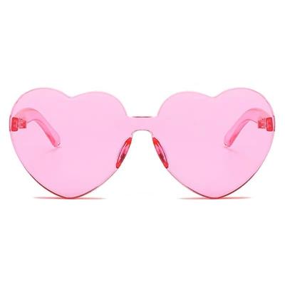 China Fashion Sunglasses Peach Heart Sunglasses Love Sunglasses Jelly Color Rimless Heart Shaped One Piece Glass Colored Lenses for sale