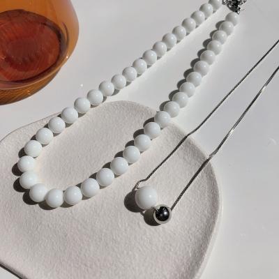 China Fashionable temperament new simple white pearl double-layer necklace girl two-piece collarbone chain necklace for sale