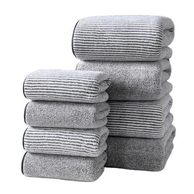 China Compressed Fat Soft And Super Absorbent Coral Fleece Towel With Charcoal Bamboo Fiber for sale