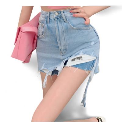 China Breathable the new women's summer denim pocket skirt with tassel irregular scheme and wear-resistant butt wrap skirt for sale