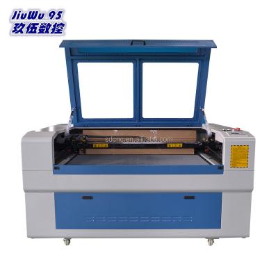 China Laser CUT Double Heads Laser Cutting Machine Bed Size 1300*900mm for sale